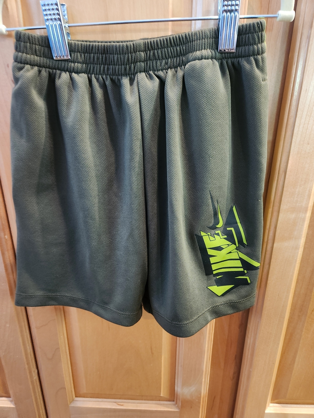 Nike Kids Olive Green Shorts with Neon Yellow Logo